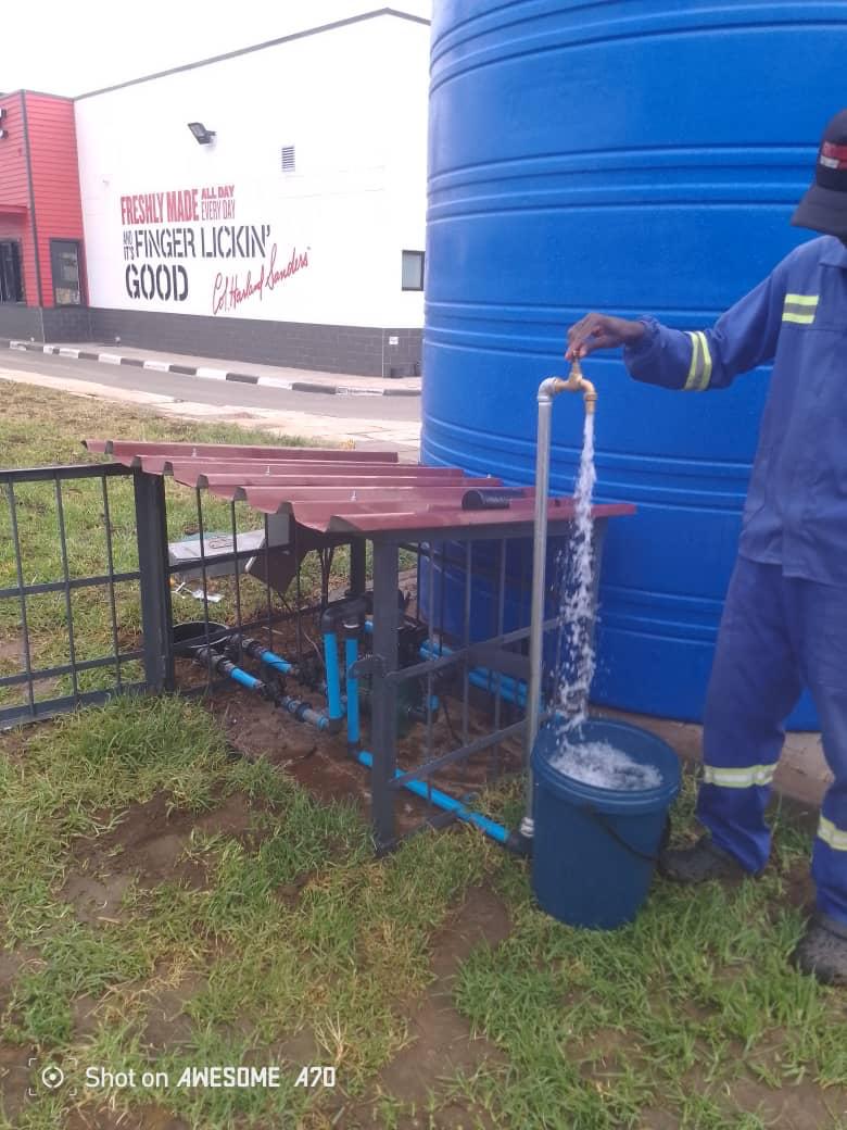 Plumber tightening pipe joint